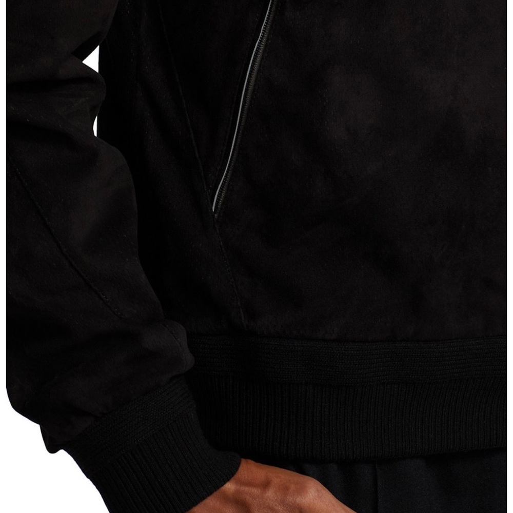 This mockneck, zip-up jacket features side zip pockets.